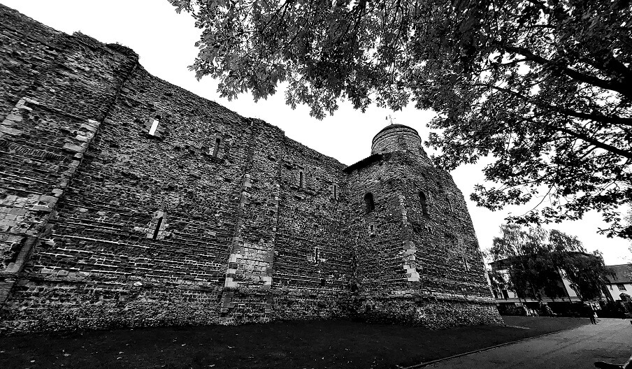 A black and white photograph of Colchester Castle